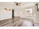 Bright and airy bedroom featuring wood floors, recessed lighting, and cove ceiling detail at 3198 Stella Cilento Ave, Henderson, NV 89044