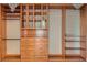 Well-organized walk-in closet with custom shelving, drawers, and hanging rods, providing ample storage space at 3198 Stella Cilento Ave, Henderson, NV 89044