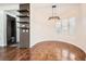 Bright and inviting dining room featuring hardwood floors, and a modern light fixture at 3198 Stella Cilento Ave, Henderson, NV 89044