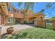 Exterior view of a two-story stucco home with a well-manicured lawn at 3198 Stella Cilento Ave, Henderson, NV 89044