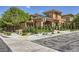 Charming two-story home featuring a manicured lawn and mature trees in a corner lot at 3198 Stella Cilento Ave, Henderson, NV 89044
