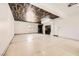 Spacious garage with decorative ceiling and plenty of room for storage and vehicles at 3198 Stella Cilento Ave, Henderson, NV 89044