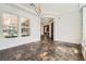 Bright living room with stone floors, large windows, and an open layout at 3198 Stella Cilento Ave, Henderson, NV 89044