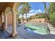 Beautiful backyard featuring a cozy plunge pool, columns, and outdoor seating at 3198 Stella Cilento Ave, Henderson, NV 89044