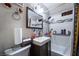 Compact bathroom featuring a tiled shower/tub combo, and decorated walls at 343 Tungsten St, Henderson, NV 89015