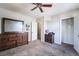 Bedroom with carpeted floors, neutral colored walls, and wood furniture at 343 Tungsten St, Henderson, NV 89015