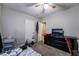 Bedroom featuring carpeted floors, a TV on a dresser, and two doors at 343 Tungsten St, Henderson, NV 89015