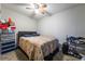 Simple bedroom featuring a ceiling fan and space for a bed and storage at 343 Tungsten St, Henderson, NV 89015