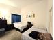 Comfortable bedroom with twin beds and ample space at 350 S Durango Dr # 220, Las Vegas, NV 89145