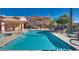 Inviting community pool with sun loungers and seating areas at this complex, perfect for relaxation and socializing at 350 S Durango Dr # 220, Las Vegas, NV 89145