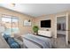 Serene bedroom featuring a plush bed, a view of the pool, and closet at 3558 Wayne Cir, Las Vegas, NV 89121