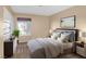 Comfortable bedroom with soft lighting, neutral paint, and modern furnishings at 3558 Wayne Cir, Las Vegas, NV 89121