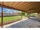 Spacious covered back patio overlooking a large backyard, great for outdoor entertaining at 3753 S Rosecrest Cir, Las Vegas, NV 89121