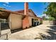 View of Backyard with privacy fence, patio, and detached garage at 3753 S Rosecrest Cir, Las Vegas, NV 89121