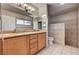 Bathroom with double sink vanity and tiled shower at 3753 S Rosecrest Cir, Las Vegas, NV 89121