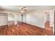 Spacious bedroom features a ceiling fan, wood floors, and walk-in closet at 3753 S Rosecrest Cir, Las Vegas, NV 89121