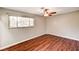 Bedroom with ceiling fan and bright window at 3753 S Rosecrest Cir, Las Vegas, NV 89121