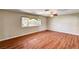 Sunny bedroom features wood-look flooring at 3753 S Rosecrest Cir, Las Vegas, NV 89121