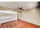 Bedroom features a ceiling fan and built in shelving unit at 3753 S Rosecrest Cir, Las Vegas, NV 89121
