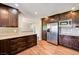 Modern kitchen with stainless steel appliances, stone countertops, and ample cabinet space at 3753 S Rosecrest Cir, Las Vegas, NV 89121