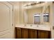 Double sinks and vanities are featured in this well lit and inviting bathroom at 4017 Kristina Lynn Ave, North Las Vegas, NV 89081