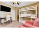 Bright bedroom features a ceiling fan and window with natural light at 4017 Kristina Lynn Ave, North Las Vegas, NV 89081