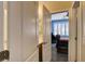 A partial view of a bedroom with blue walls and a door to the bathroom at 4017 Kristina Lynn Ave, North Las Vegas, NV 89081