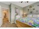 Charming bedroom offers a comfortable bed and bright, natural light at 4017 Kristina Lynn Ave, North Las Vegas, NV 89081