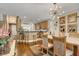 Charming dining area featuring bar seating and an open layout with modern lighting fixtures at 4017 Kristina Lynn Ave, North Las Vegas, NV 89081