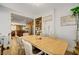 A dining room features a marble table and a view into the kitchen at 4017 Kristina Lynn Ave, North Las Vegas, NV 89081