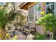 Inviting front porch with comfortable chairs and a lush garden at 4017 Kristina Lynn Ave, North Las Vegas, NV 89081