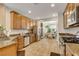 Well-equipped kitchen with stainless steel appliances, granite countertops, and ample cabinet space at 4017 Kristina Lynn Ave, North Las Vegas, NV 89081