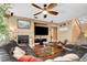 Inviting living room with a fireplace, large TV, and stylish decor, perfect for relaxation at 4017 Kristina Lynn Ave, North Las Vegas, NV 89081