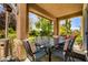 Charming covered patio features an outdoor dining area perfect for entertaining guests at 4017 Kristina Lynn Ave, North Las Vegas, NV 89081