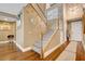 Staircase with wood floors and carpeted steps leads to the second floor at 4017 Kristina Lynn Ave, North Las Vegas, NV 89081