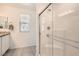 Bright bathroom with a glass-enclosed shower and contemporary finishes at 489 Filaree Pl, Henderson, NV 89015