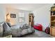 Bright bedroom with carpet flooring, a cozy bed, and ample space for decor at 489 Filaree Pl, Henderson, NV 89015