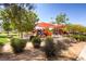 Community playground with play equipment, shade, and landscaping for outdoor fun at 489 Filaree Pl, Henderson, NV 89015