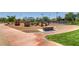 Community playground featuring -safe play structures and seating area, perfect for outdoor recreation at 489 Filaree Pl, Henderson, NV 89015