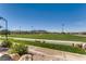 Expansive soccer field with green grass, nets, and a clear blue sky in a community park at 489 Filaree Pl, Henderson, NV 89015