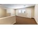 Large bonus room features neutral tones, carpet, and multiple access doors at 5005 Chambliss Dr, Las Vegas, NV 89130