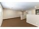 Spacious bonus room with neutral tones, carpet flooring, and abundant natural light at 5005 Chambliss Dr, Las Vegas, NV 89130