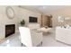 Warm living room featuring a brick fireplace and comfortable seating at 5005 Chambliss Dr, Las Vegas, NV 89130