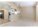 Open floor plan featuring a spacious living room connected to a modern kitchen at 5005 Chambliss Dr, Las Vegas, NV 89130