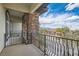 This home features a stone balcony with wrought iron railing and beautiful views at 5367 Secluded Brook Ct, Las Vegas, NV 89149