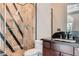 Modern bathroom with glass-enclosed shower, sleek vanity, and stylish finishes at 5367 Secluded Brook Ct, Las Vegas, NV 89149