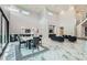 Expansive living area featuring marble floors, soaring ceilings, and abundant natural light, perfect for luxury living at 5367 Secluded Brook Ct, Las Vegas, NV 89149
