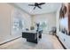 Bright office space with custom built-ins, a modern desk, and ample natural light creating a productive work environment at 5367 Secluded Brook Ct, Las Vegas, NV 89149