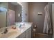 Bathroom featuring double sinks with white countertops and neutral wall color at 6623 Brick House Ave, Las Vegas, NV 89122
