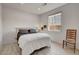 Cozy bedroom with a queen-sized bed and neutral decor at 6830 Compass St, North Las Vegas, NV 89084